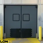 Closed double-swing PE-9000 industrial door with metal frame and black impact plates, installed in a high-traffic warehouse entryway