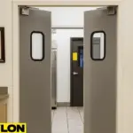 Open Restaurant Door PE-610ALC – Double stainless steel traffic doors revealing a commercial kitchen area, ideal for restaurants and food service settings