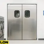 Retail Door PE-620ALC installed in a commercial laundromat, providing secure and discreet access to backroom areas while maintaining a clean, professional look