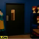 Retail Door PE-710 black swinging door with narrow vision panel installed in a backstage storage area, next to metal shelving, ideal for cosplay studios, costume shops, and theatrical backroom