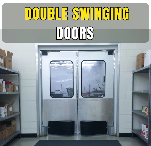 A white double swinging door with stainless steel kick plates and bumpers separating two aisles of a stockroom