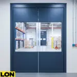 Blue PVC loading dock doors with reinforced panels and clear windows in a distribution center Blue PVC loading dock doors with reinforced panels and clear windows in a distribution center