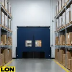 Blue double swinging doors between warehouse aisles, ideal for pallet traffic and temperature-controlled storage