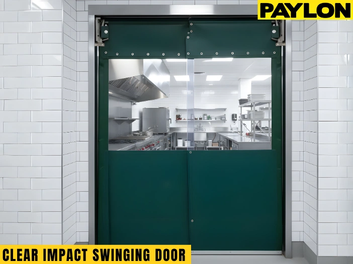 Clear Impact Swinging Door installed in a commercial kitchen, showing durable PVC panels and full visibility