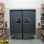 Closed double swinging doors in a storage room surrounded by shelves and boxes, showing impact-resistant design