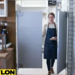 Gray PE-Series restaurant café door in a coffee shop with staff carrying plates through it Gray PE-Series restaurant café door in a coffee shop with staff carrying plates through it