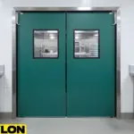 PE-160 Flexible Clear Impact Swinging Door in a restaurant prep area with transparent panels and reinforced frame