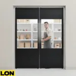 PE-400 Clear Impact Swinging Door being opened in a stockroom, demonstrating hands-free two-way swing and durability