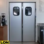 PE-510ALC aluminum swinging doors in a modern café, offering lightweight and space-efficient kitchen access
