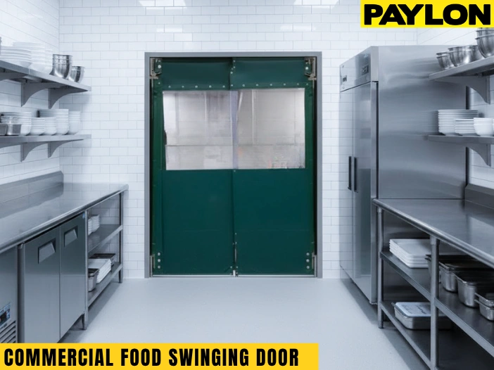 PVC swinging doors in a commercial kitchen providing sanitary separation between prep and storage areas