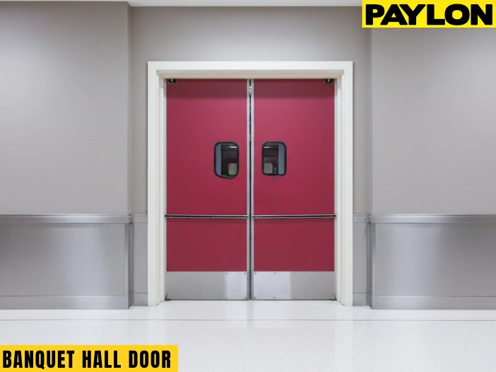 Red Banquet Hall Swinging Door – Front view of a red Banquet Hall Swinging Door with vision panels in a neutral hallways Red Banquet Hall Swinging Door – Front view of a red Banquet Hall Swinging Door with vision panels in a neutral hallway