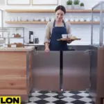 Small gray café doors with staff passing through while serving drinks in a café settingS Small gray café doors with staff passing through while serving drinks in a café setting