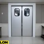 White Banquet Hall Swinging Door – Closed white Banquet Hall Swinging Door with rectangular vision panels in an event space corridors White Banquet Hall Swinging Door – Closed white Banquet Hall Swinging Door with rectangular vision panels in an event space corridor