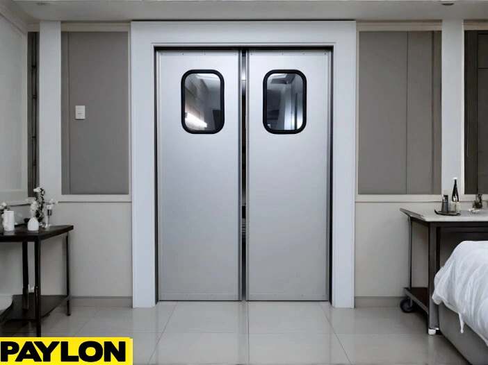 White Banquet Hall Swinging Door – Closed white Banquet Hall Swinging Door with rectangular vision panels in an event space corridors White Banquet Hall Swinging Door – Closed white Banquet Hall Swinging Door with rectangular vision panels in an event space corridor