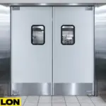 White aluminum double swinging doors with large stainless steel kick plates installed in a commercial kitchen
