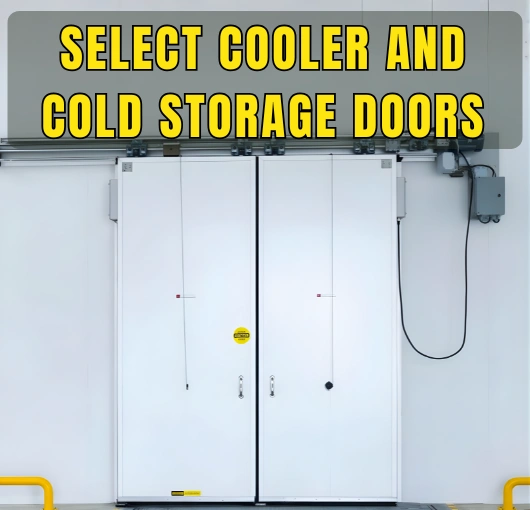 White insulated double sliding door in a commercial cold storage facility with text overlay that reads “Select Cooler and Cold Storage Doors.”