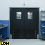 Industrial impact doors in cleanroom with blue and white interior