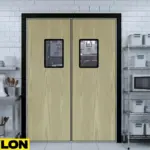 Paylon commercial kitchen swinging doors in a modern restaurant prep area, USA – durable wood-finish design for clean and efficient kitchens