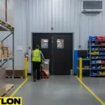 Black double swinging doors for church hall entryways, providing quiet self-closing and easy passage for volunteers.