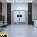 Front desk area with swinging doors separating guest and service pathways