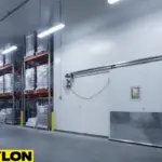 Motorized sliding cooler door used in a large industrial cold storage facility, helping control air movement and maintain stable cooler temperatures.