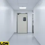Single beige medical lab swinging door in a narrow hallway, highlighting compact lab design.