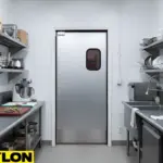 Single gray commercial swinging door with vision panel installed in a stainless kitchen prep area for fast, hands-free entry.