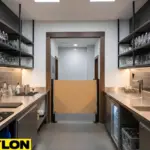 Bar swinging door with reinforced hinges and kick plates in a busy back-of-house bar setup.