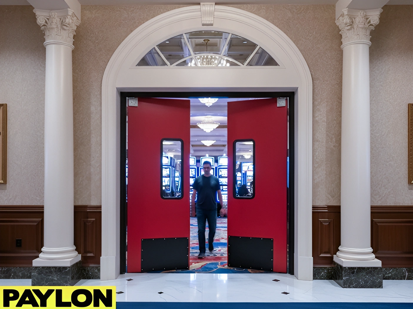 Casino entrance with double doors opening toward the gaming floor to support smooth guest entry and exit.