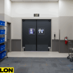 Casino service hallway with double exit doors designed to handle frequent staff traffic and equipment movement.