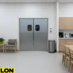 Closed double swinging doors separating an exhibit room from a shared public space