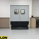 Double staff lounge swinging doors separating shared employee seating areas