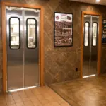 Heavy duty stainless steel swinging door suited for commercial food service and kitchen environments.