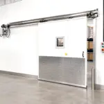 PAYLON PC-2000 swinging cooler door built for high-traffic refrigerated environments in commercial or industrial facilities.