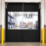 A PVC swing door installed in a food processing facility, providing hygienic separation between work areas.