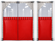 A PVC impact swinging door installed in an industrial or commercial doorway, built to withstand repeated forklift and cart traffic.
