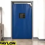 Easy-clean PVC swinging doors installed in a commercial facility doorway, suitable for food service or industrial use.